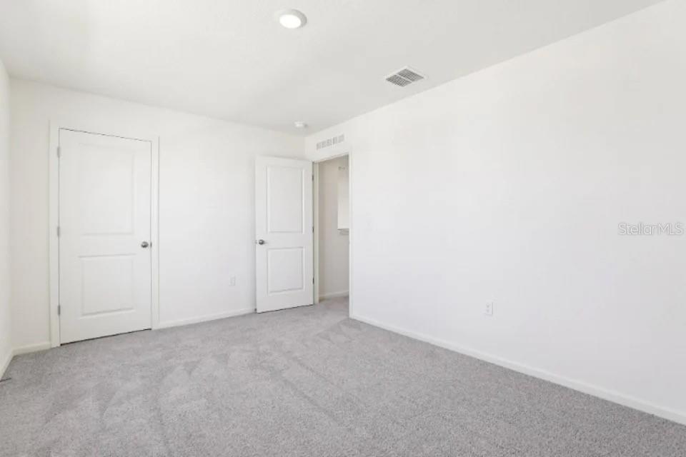 673 Hillview Loop Haines City, FL 33844 - Photo 8 of 14 a view of an empty room