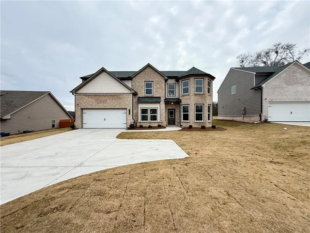 a view of a house with a snow in front of house
