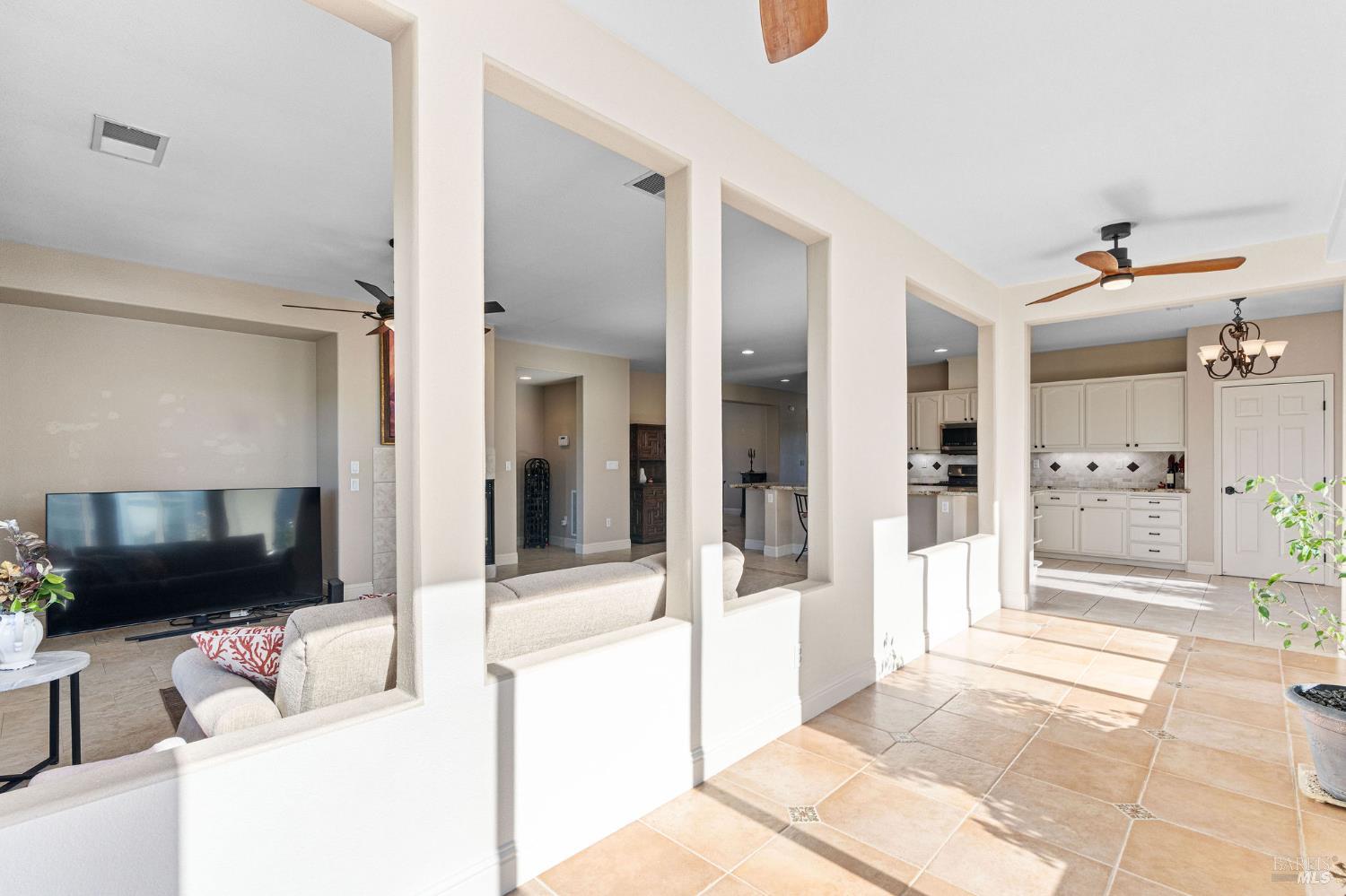 351 Spyglass Drive Rio Vista, CA 94571 - Photo 16 of 63 a living room with furniture and a flat screen tv