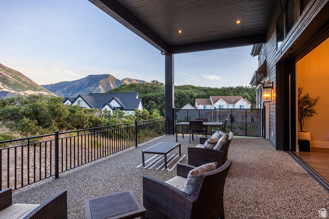 3247 South Mapleton Estates Drive Mapleton, UT 84664 - Photo 4 of 70 View of patio with a mountain view and outdoor furniture