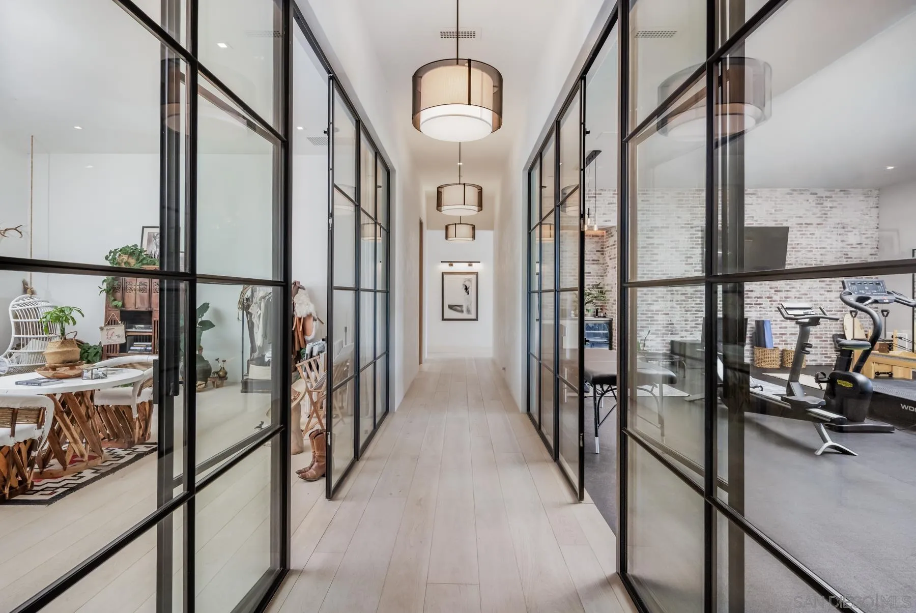 14783 Roxbury Terrace Rancho Santa Fe, CA 92067 - Photo 14 of 64 a view of a hallway with wooden floor and staircase