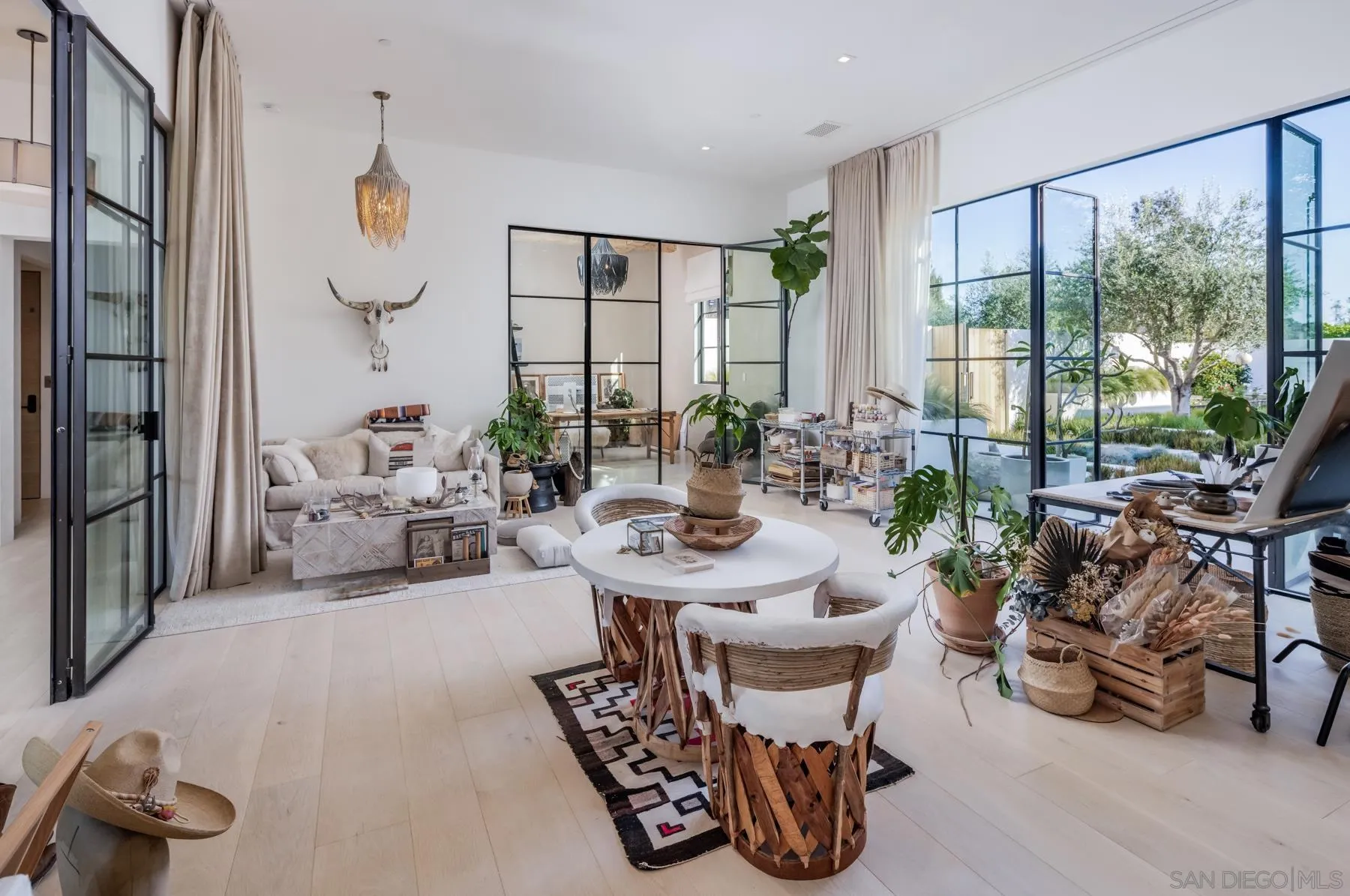 14783 Roxbury Terrace Rancho Santa Fe, CA 92067 - Photo 17 of 64 a dining room with furniture water view and a floor to ceiling window