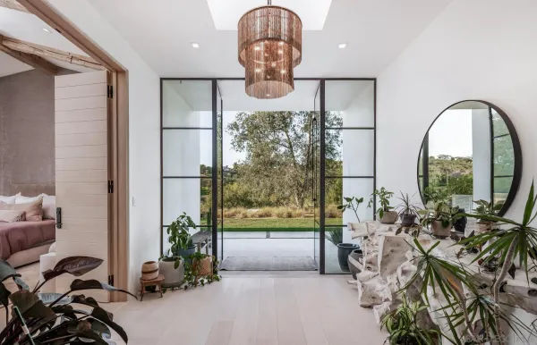 a spacious bathroom with a double vanity sink and a mirror