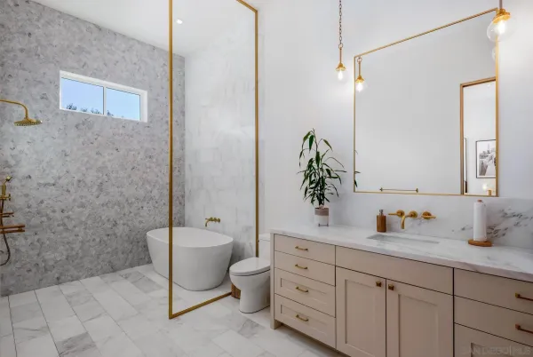 a bathroom with a double vanity sink and a mirror