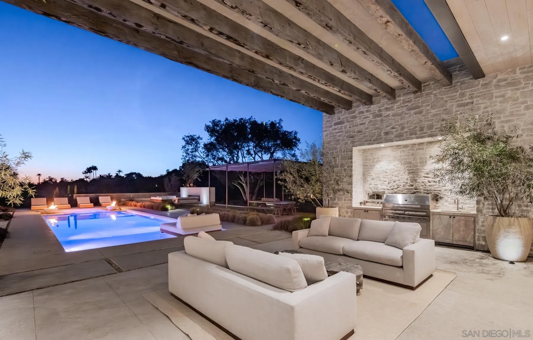 14783 Roxbury Terrace Rancho Santa Fe, CA 92067 - Photo 4 of 64 a living room with furniture and a fireplace