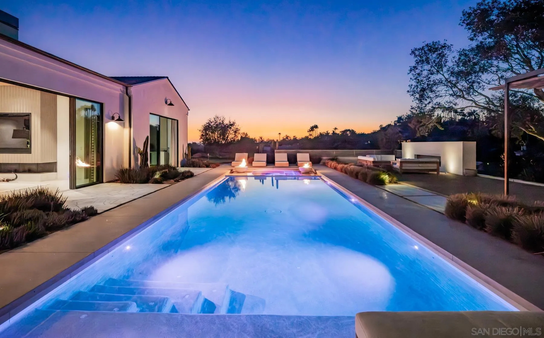14783 Roxbury Terrace Rancho Santa Fe, CA 92067 - Photo 54 of 64 a view of a swimming pool with an outdoor seating