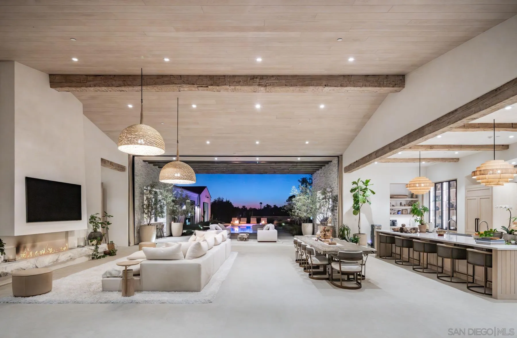 14783 Roxbury Terrace Rancho Santa Fe, CA 92067 - Photo 60 of 64 a living room with furniture and a flat screen tv