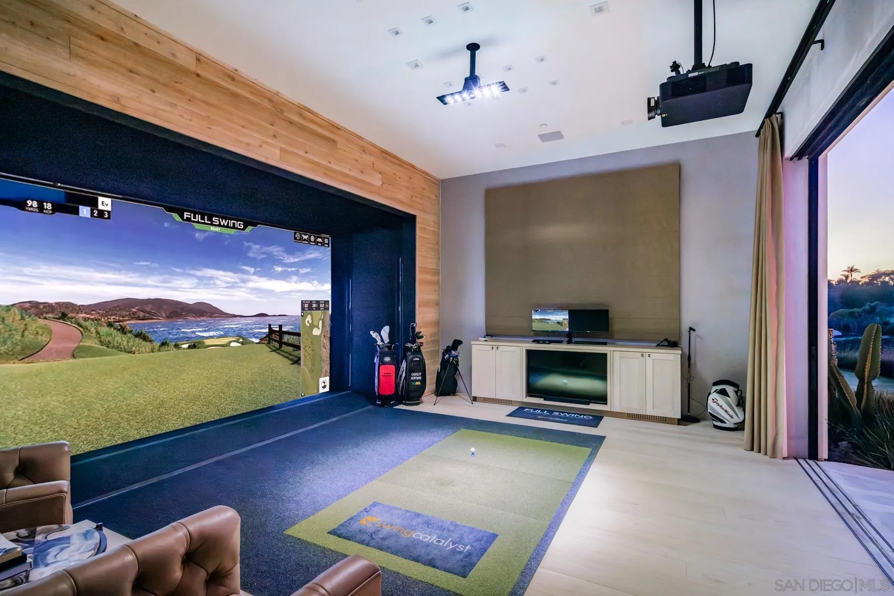 14783 Roxbury Terrace Rancho Santa Fe, CA 92067 - Photo 6 of 64 a living room with furniture and a flat screen tv