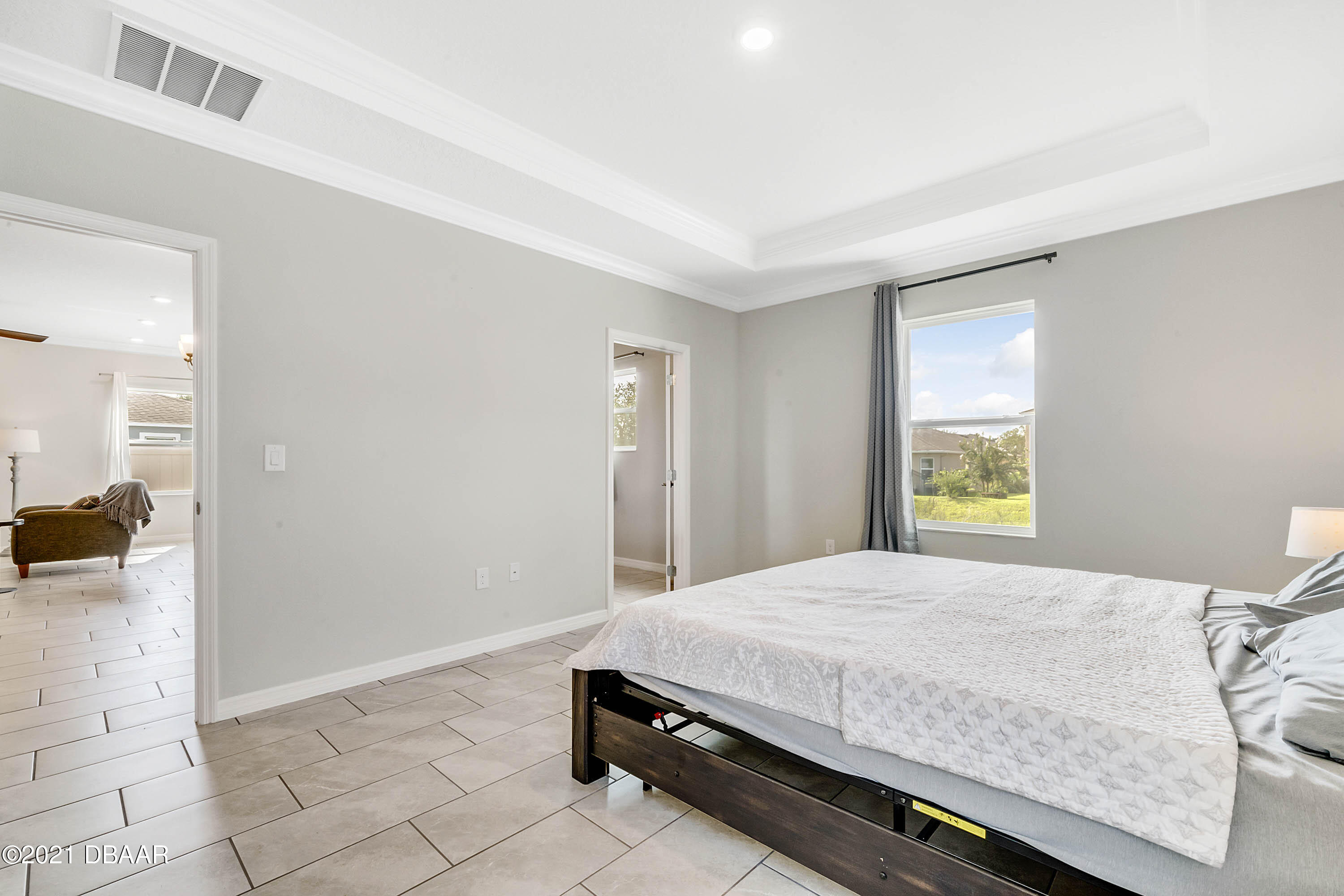 235 Jackson Loop DeLand, FL 32724 - Photo 15 of 27 a room with a bed and a view of bedroom