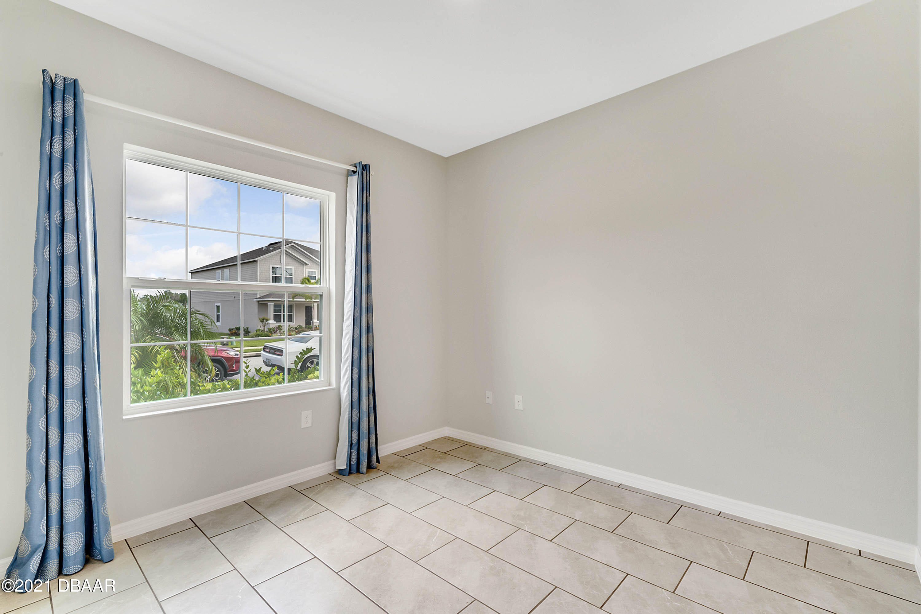 235 Jackson Loop DeLand, FL 32724 - Photo 18 of 27 an empty room with windows
