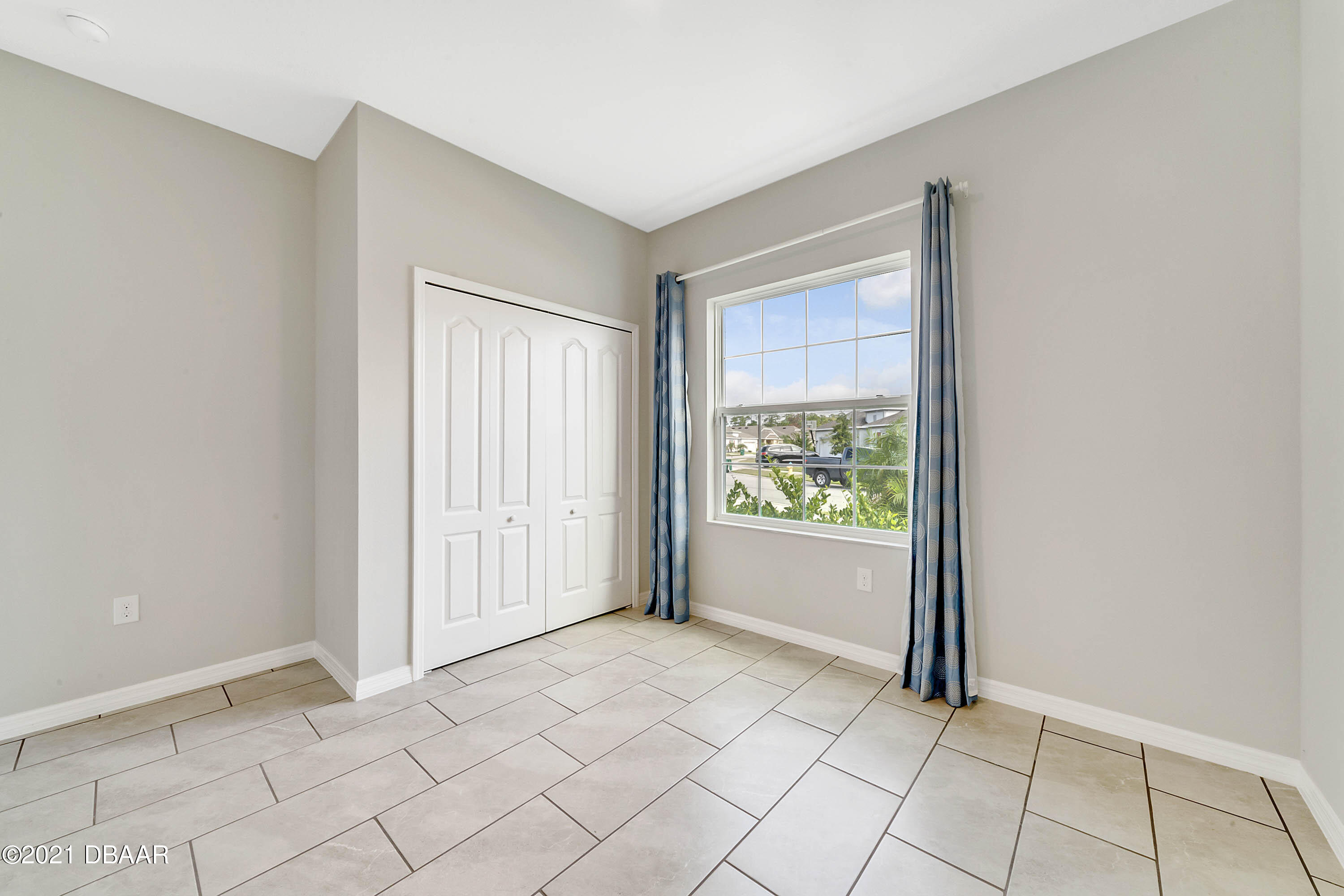 235 Jackson Loop DeLand, FL 32724 - Photo 19 of 27 a view of an empty room with window