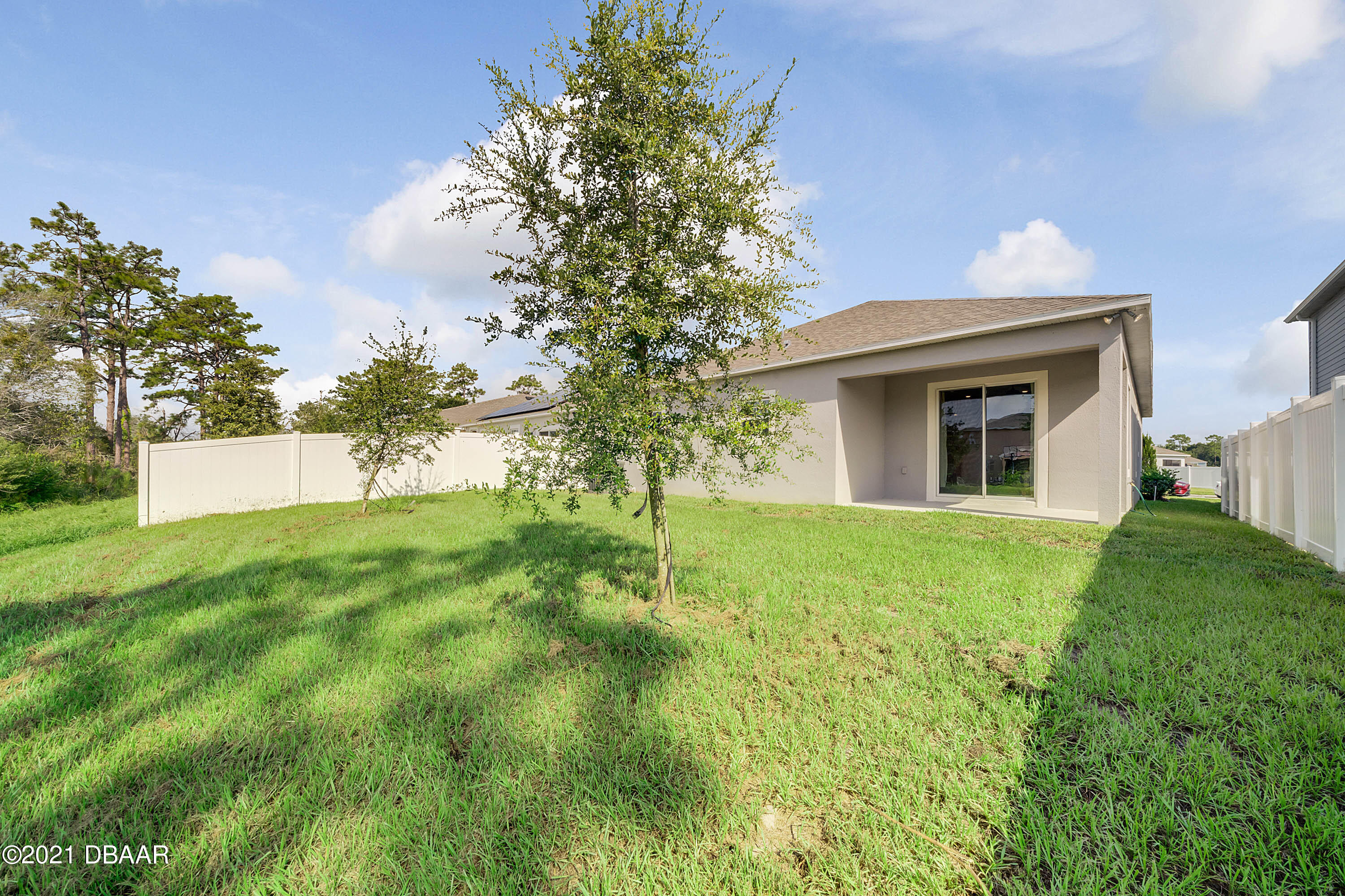 235 Jackson Loop DeLand, FL 32724 - Photo 23 of 27 a view of a house with a yard