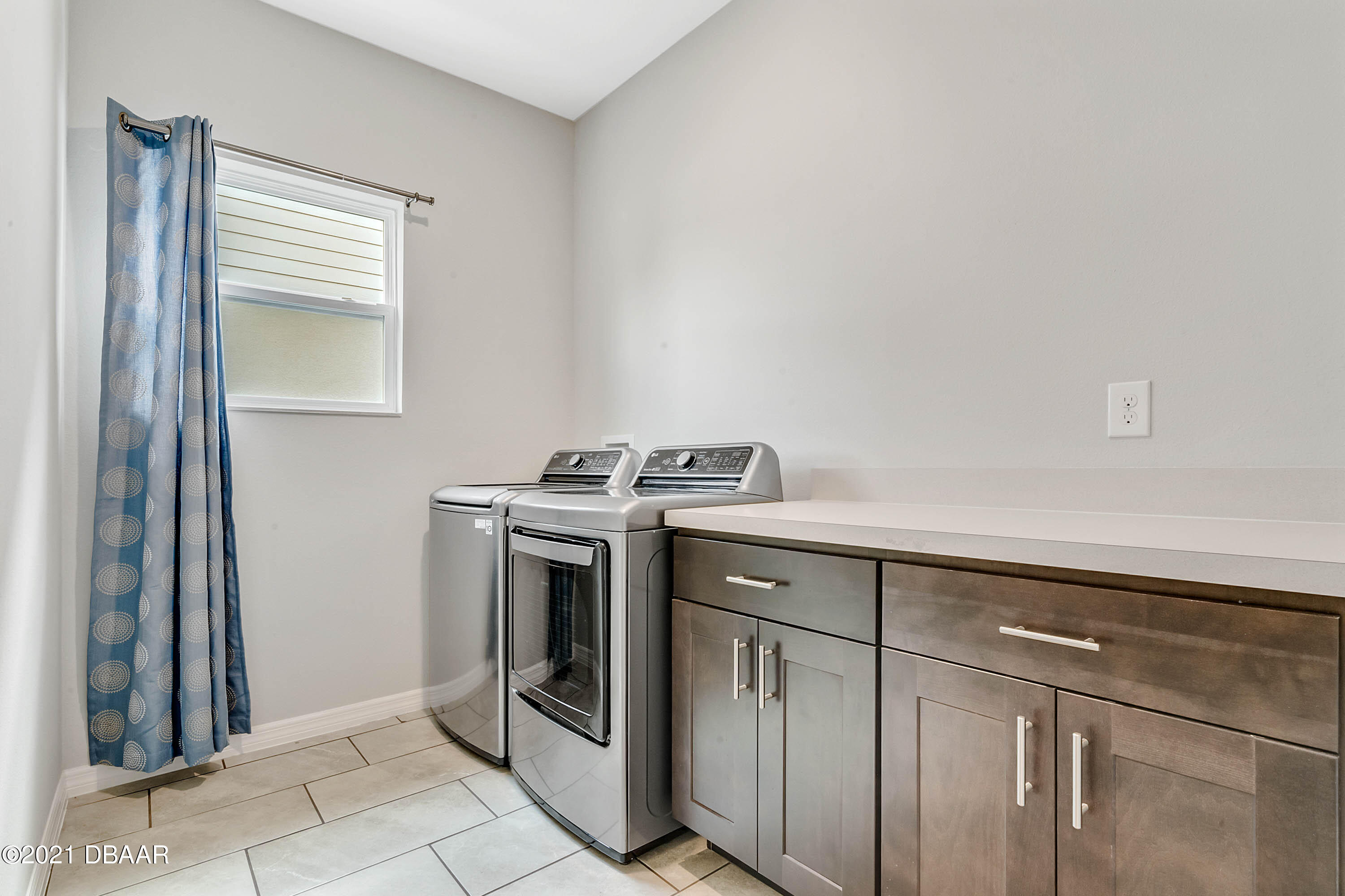 235 Jackson Loop DeLand, FL 32724 - Photo 24 of 27 a utility room with dryer and washer