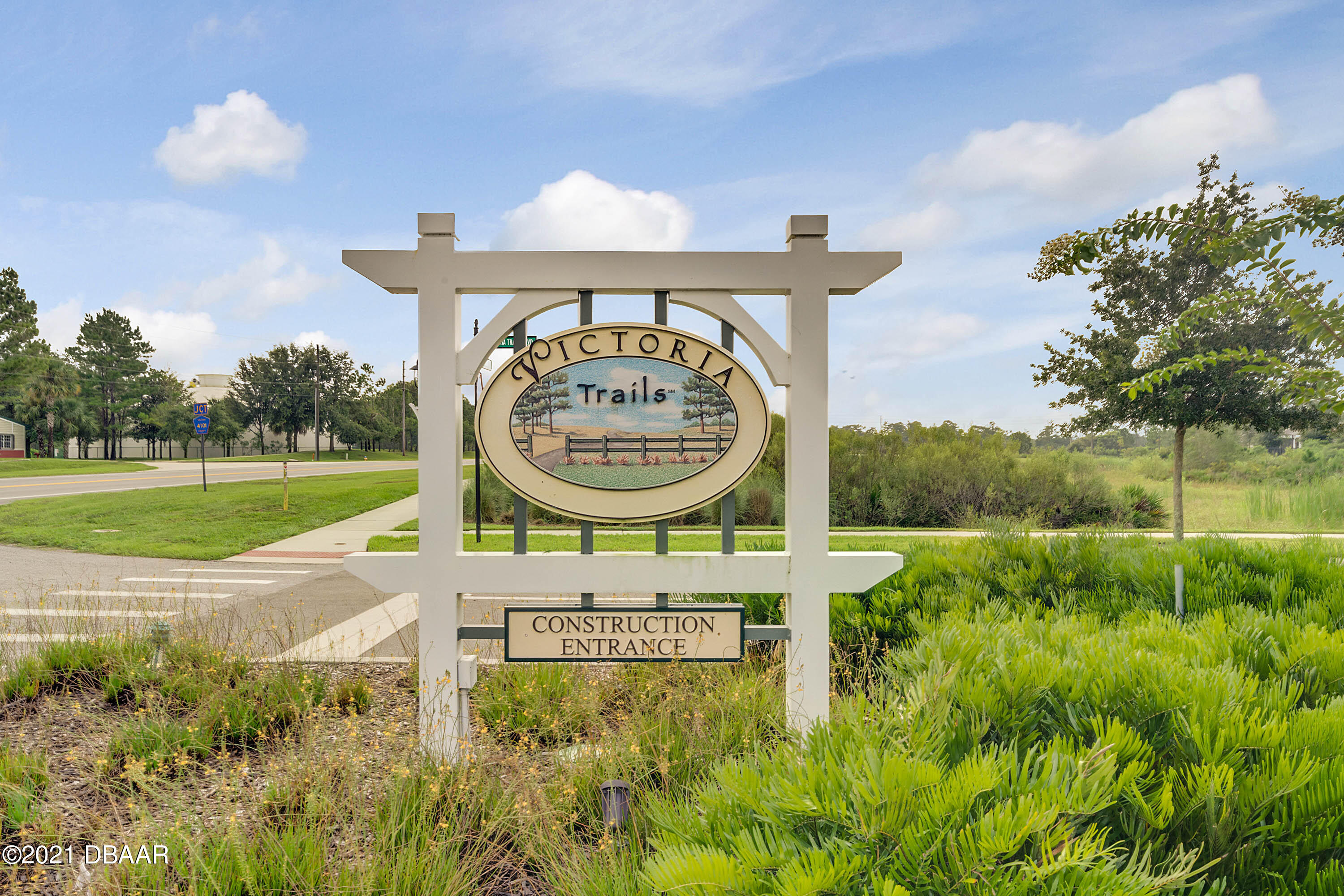 235 Jackson Loop DeLand, FL 32724 - Photo 27 of 27 a view of outdoor space with sign board