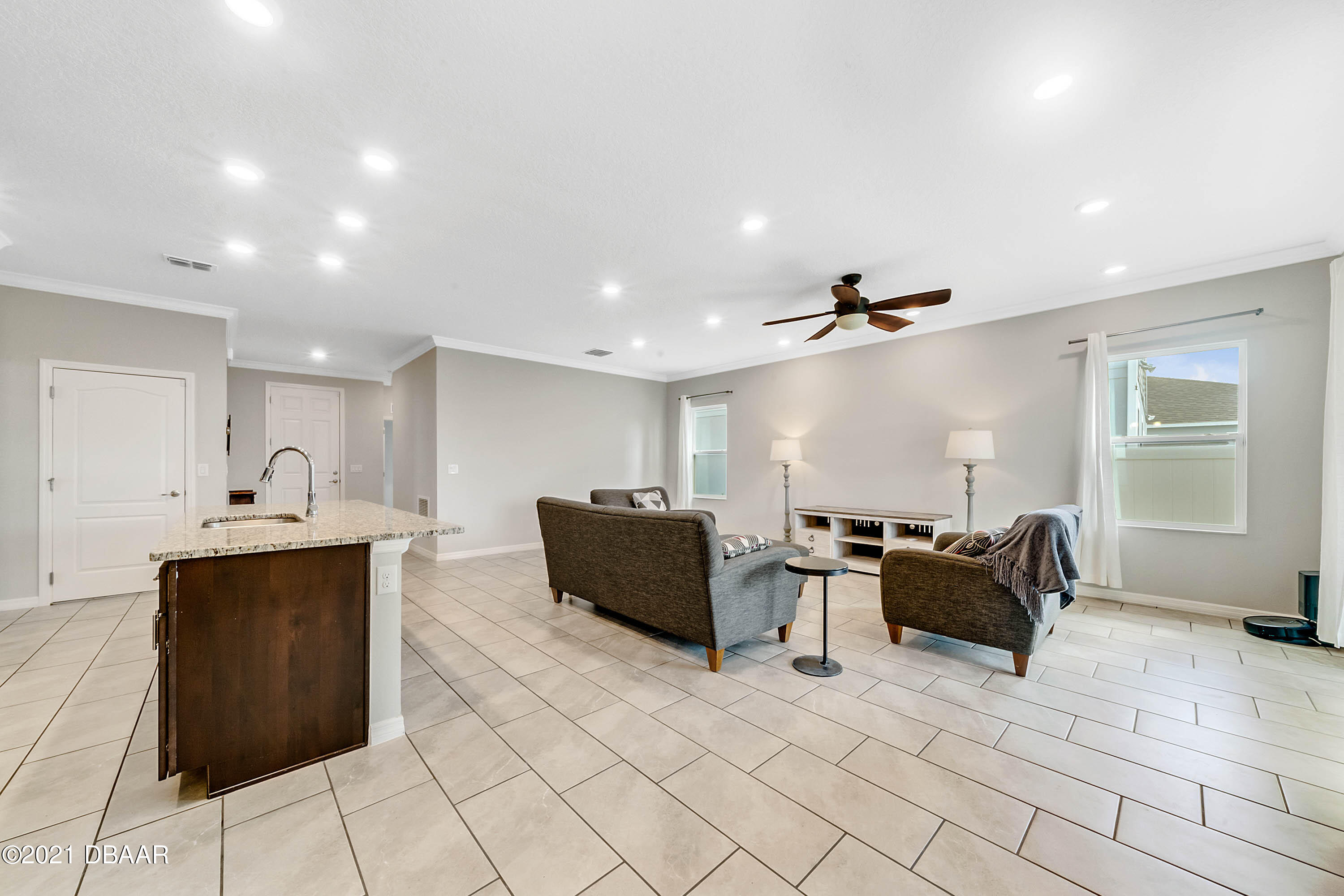 235 Jackson Loop DeLand, FL 32724 - Photo 8 of 27 a living room with furniture and a window