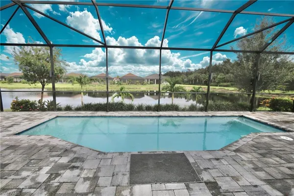 a view of outdoor space with swimming pool
