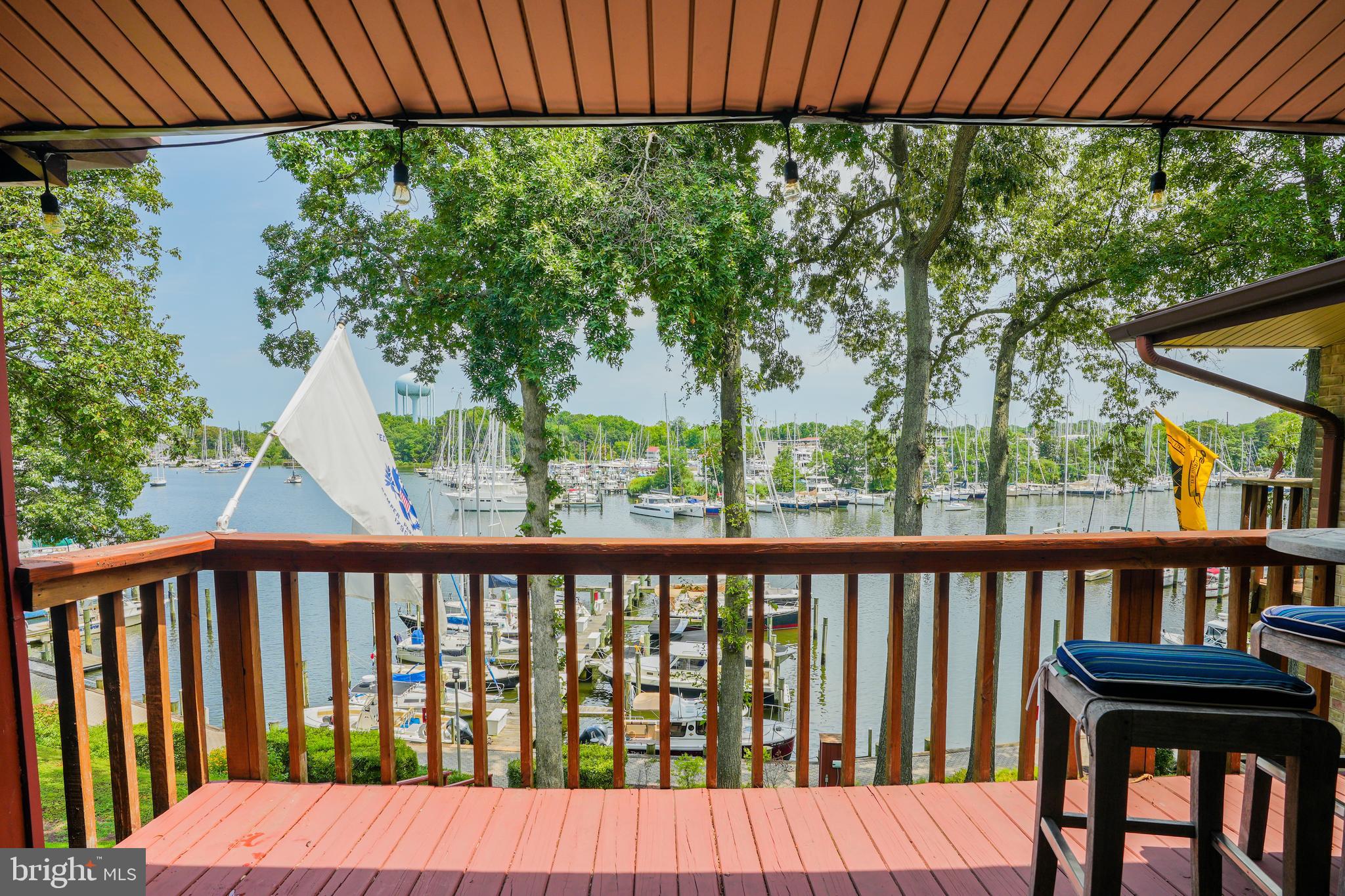 780 F Fairview Avenue, Unit F Annapolis, MD 21403 - Photo 11 of 28 a view of a wooden bench in a backyard