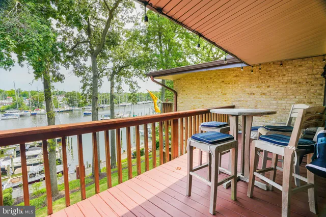 a view of a balcony with chairs