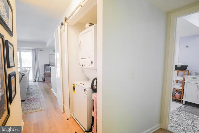 a view of a kitchen from the hallway