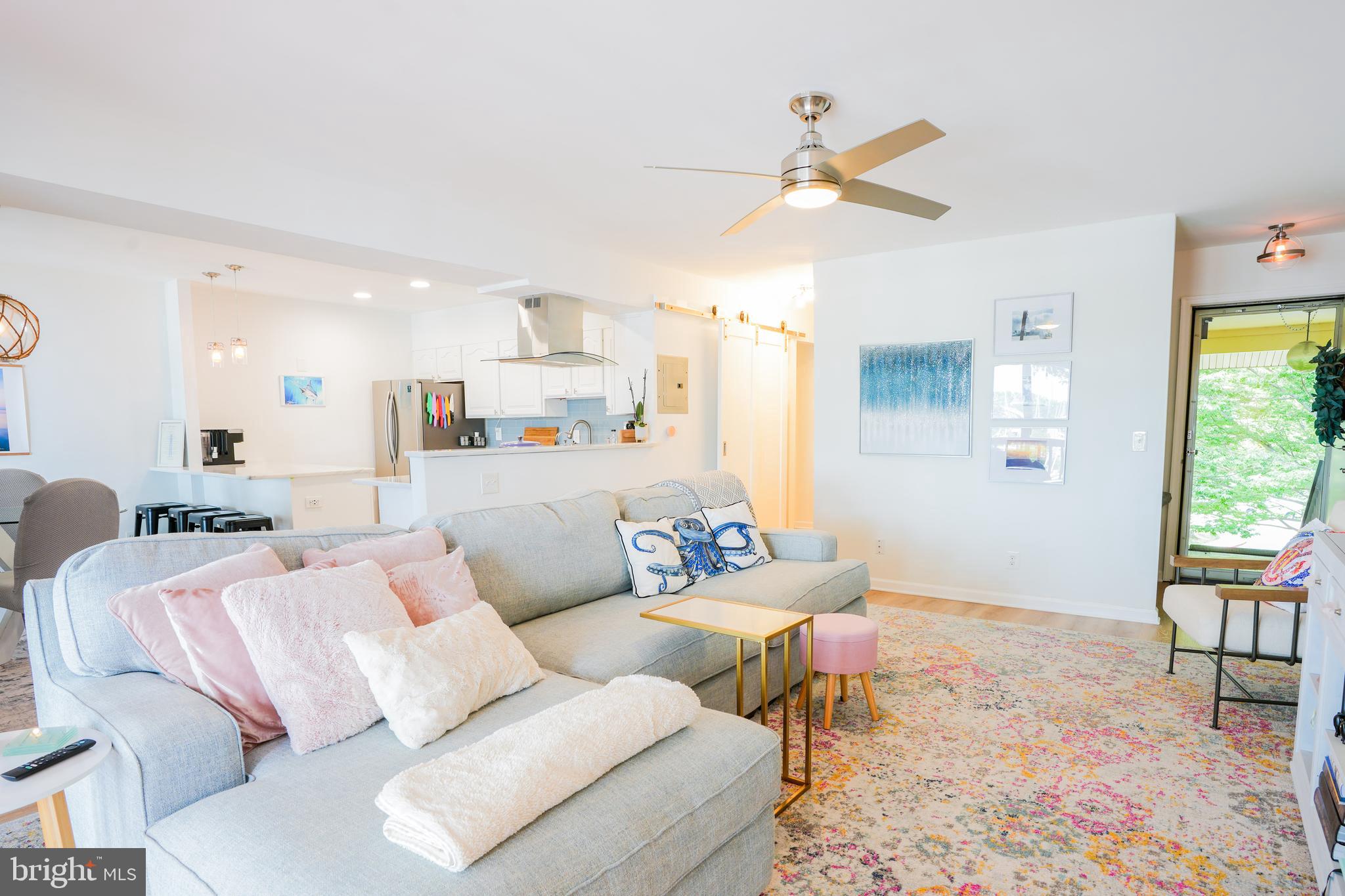 780 F Fairview Avenue, Unit F Annapolis, MD 21403 - Photo 2 of 28 a living room with furniture and a large window