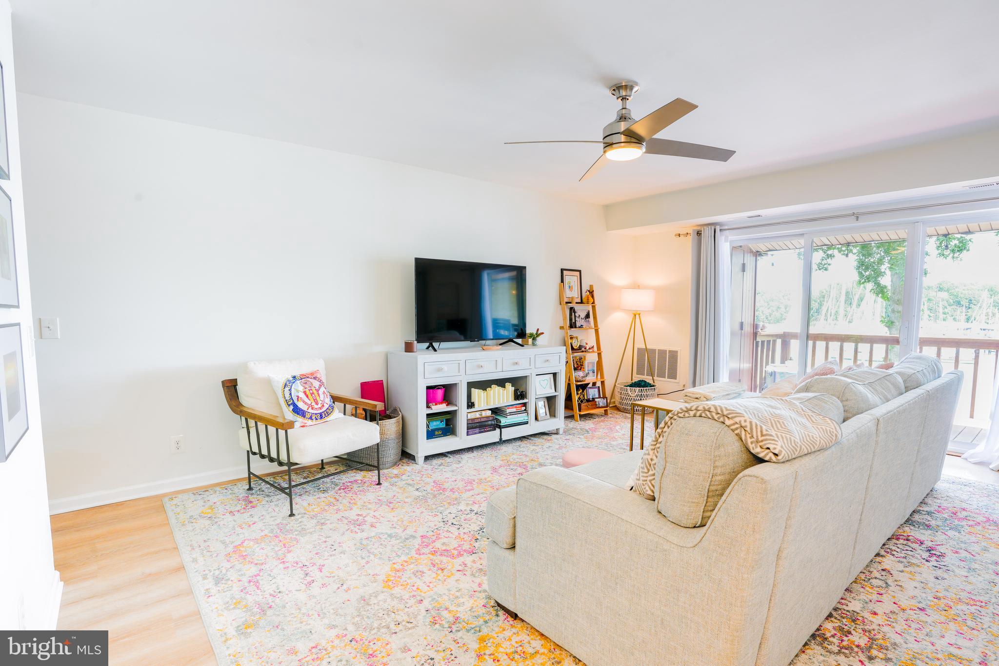 780 F Fairview Avenue, Unit F Annapolis, MD 21403 - Photo 4 of 28 a living room with furniture and a flat screen tv