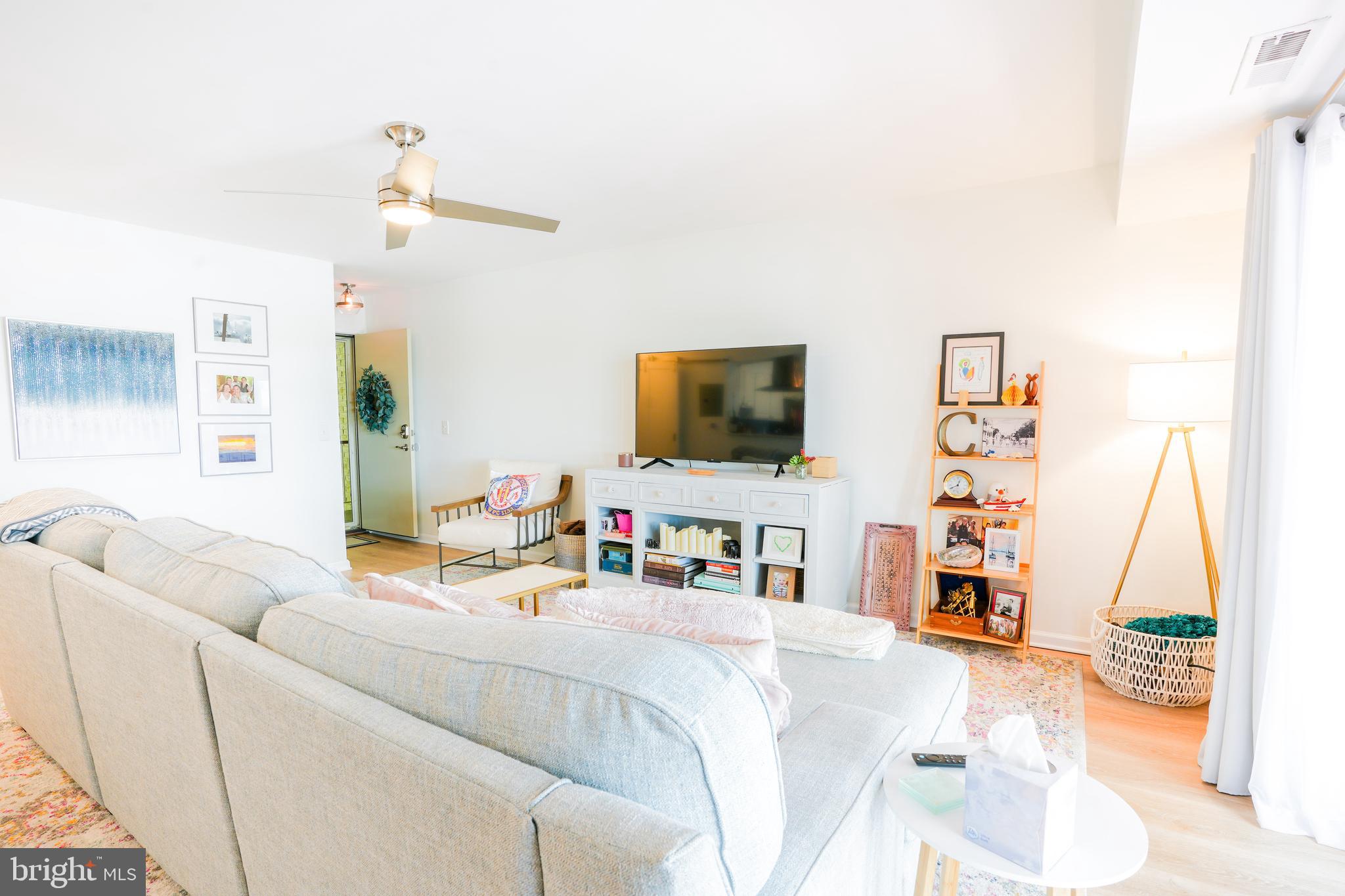 780 F Fairview Avenue, Unit F Annapolis, MD 21403 - Photo 5 of 28 a bedroom with furniture and a flat screen tv