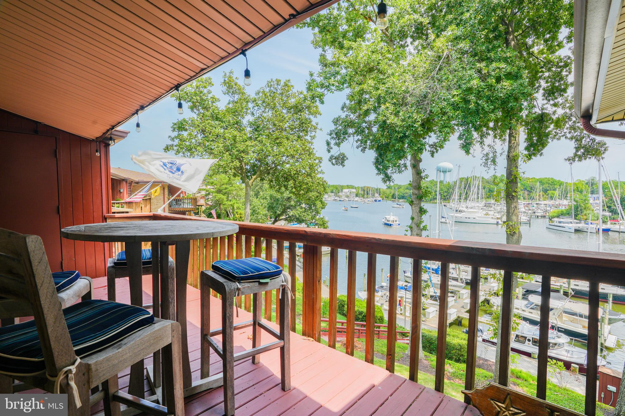 780 F Fairview Avenue, Unit F Annapolis, MD 21403 - Photo 10 of 28 a view of a balcony with wooden floor and outdoor seating