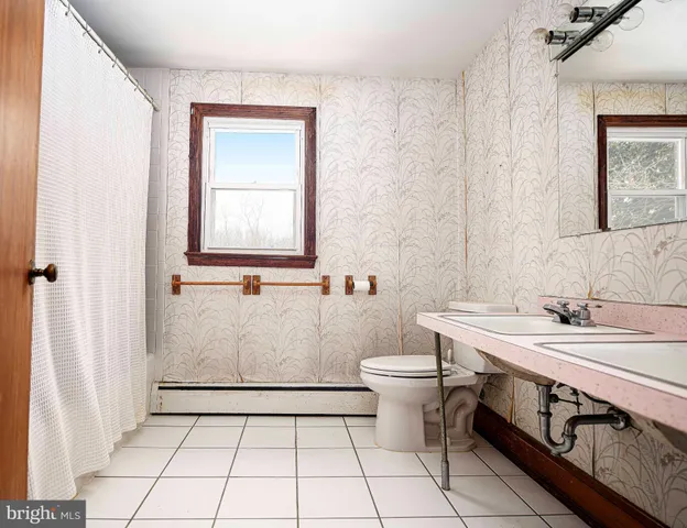 a front view of a house with swimming pool