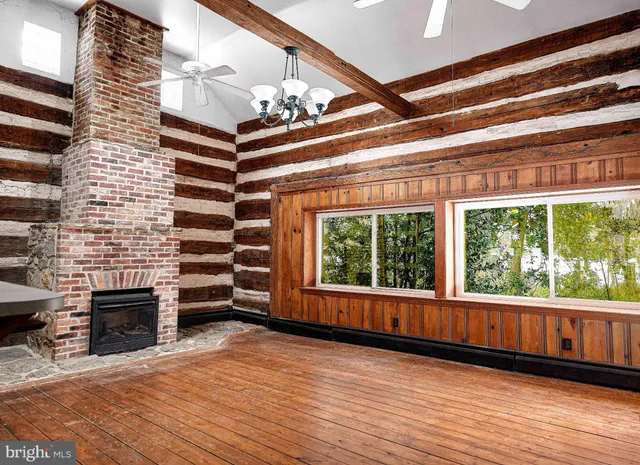 a kitchen with a sink and a large window