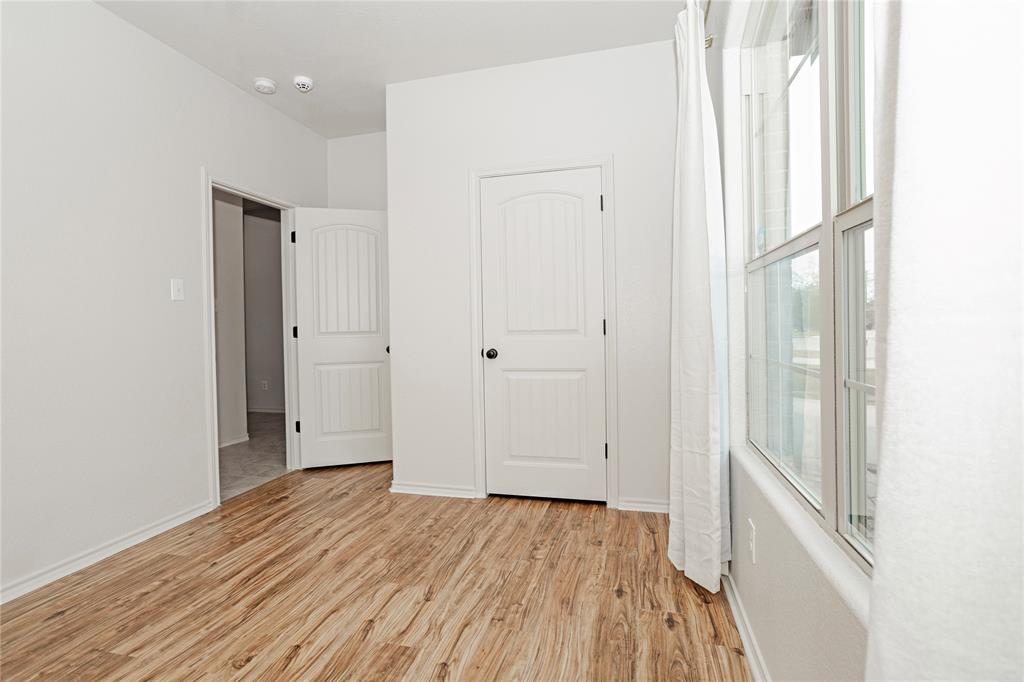 345 Chestnut Lane Ponder, TX 76259 - Photo 11 of 29 wooden floor in an empty room