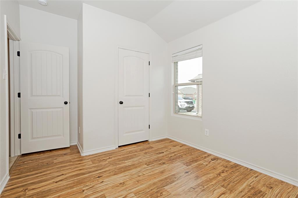 345 Chestnut Lane Ponder, TX 76259 - Photo 12 of 29 a view of empty room with wooden floor and fan