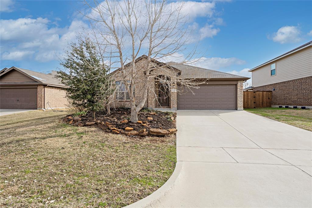 345 Chestnut Lane Ponder, TX 76259 - Photo 2 of 29 a view of a backyard of the house