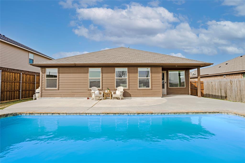 345 Chestnut Lane Ponder, TX 76259 - Photo 26 of 29 a house with swimming pool in front of it