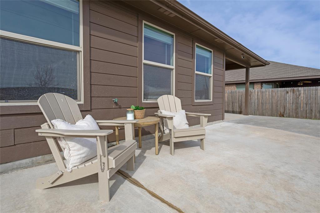 345 Chestnut Lane Ponder, TX 76259 - Photo 28 of 29 a view of two chairs in a patio