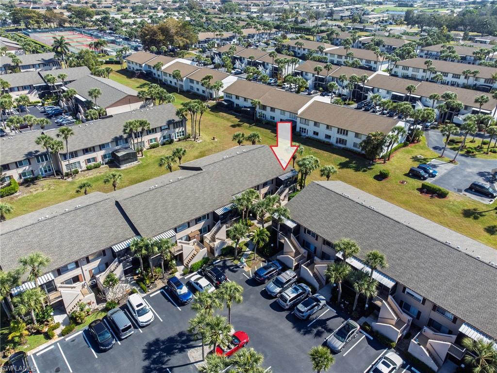 3420 Frosty Way, Unit 4902 Naples, FL 34112 - Photo 20 of 31 an aerial view of a city