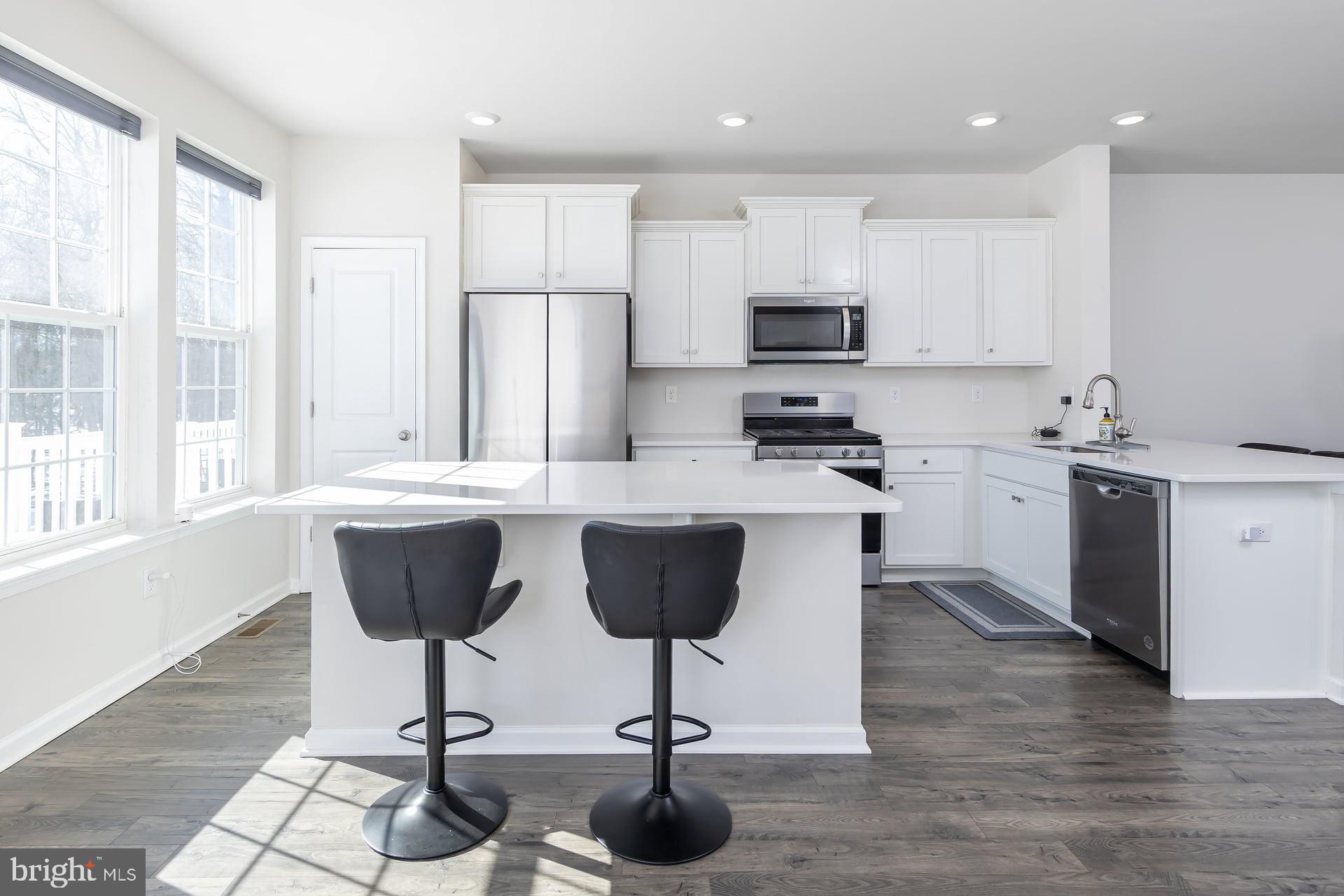 18 Foundry Boulevard Mount Holly, NJ 08060 - Photo 3 of 20 a kitchen with granite countertop a counter space a sink stainless steel appliances and cabinets