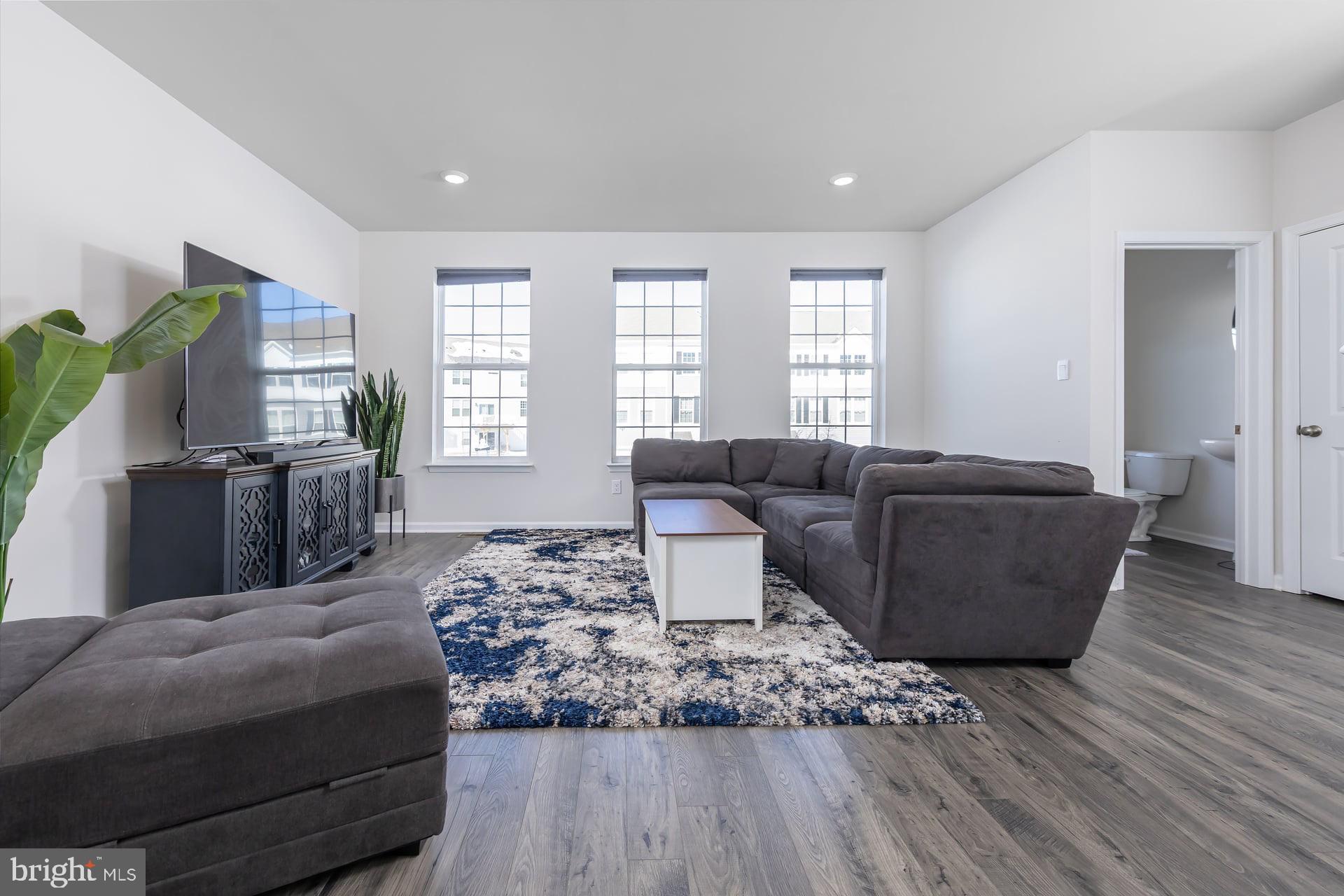 18 Foundry Boulevard Mount Holly, NJ 08060 - Photo 8 of 20 a living room with furniture and a flat screen tv