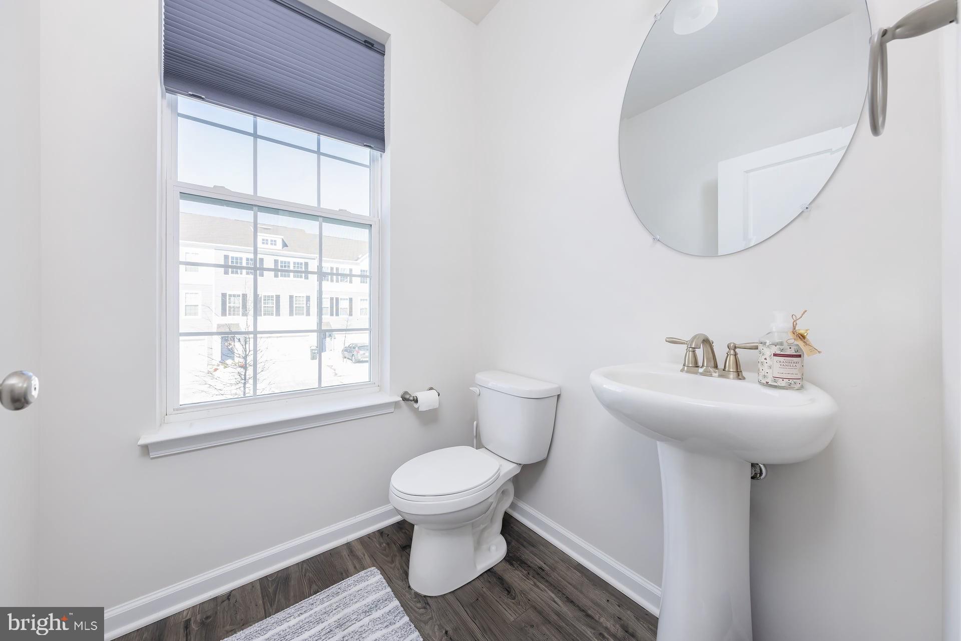 18 Foundry Boulevard Mount Holly, NJ 08060 - Photo 10 of 20 a bathroom with a sink toilet and a mirror