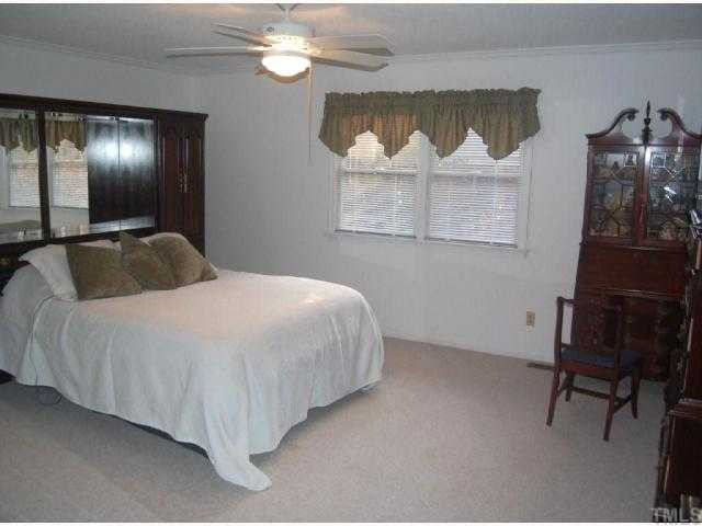8925 Oneal Road Raleigh, NC 27613 - Photo 6 of 11 Large Master Bedroom with Walk-in Closet
