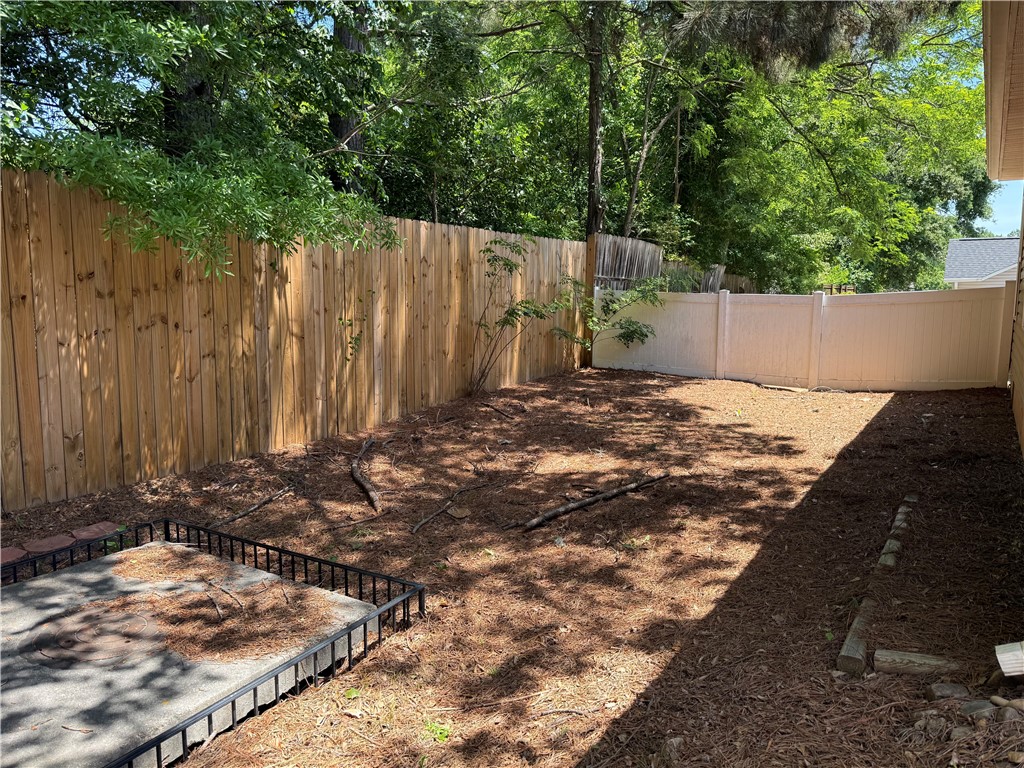 123 Abigail Lane Anderson, SC 29621 - Photo 21 of 22 This private yard provides a secure and natural outdoor retreat, perfect for relaxation or activities.