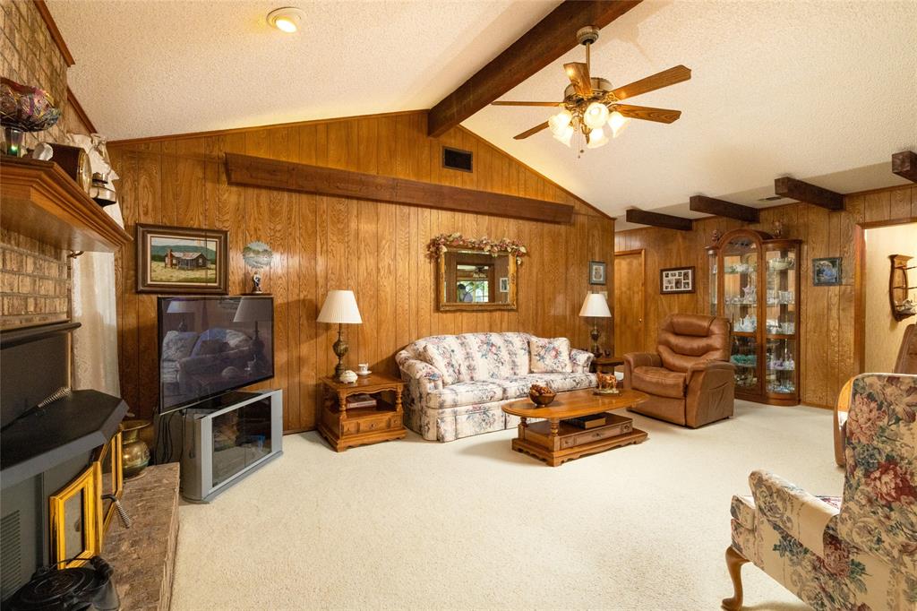 970 Live Oak Road Santo, TX 76472 - Photo 14 of 40 a view of living room with furniture and a flat screen tv