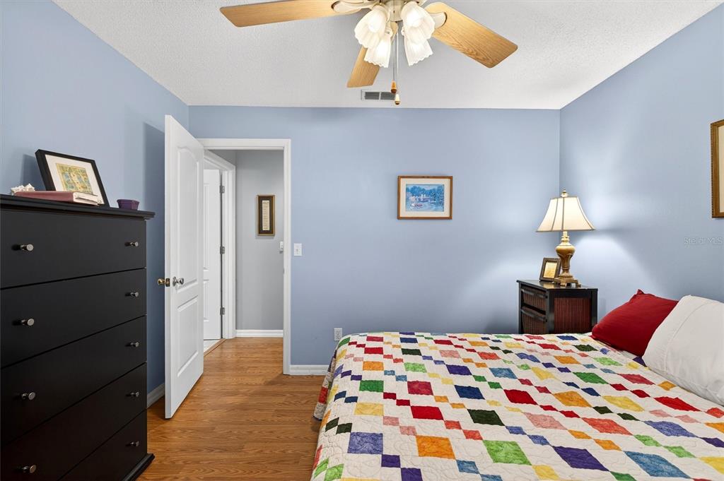 1918 Umbrella Tree Drive Edgewater, FL 32141 - Photo 25 of 44 a bedroom with bed and a window