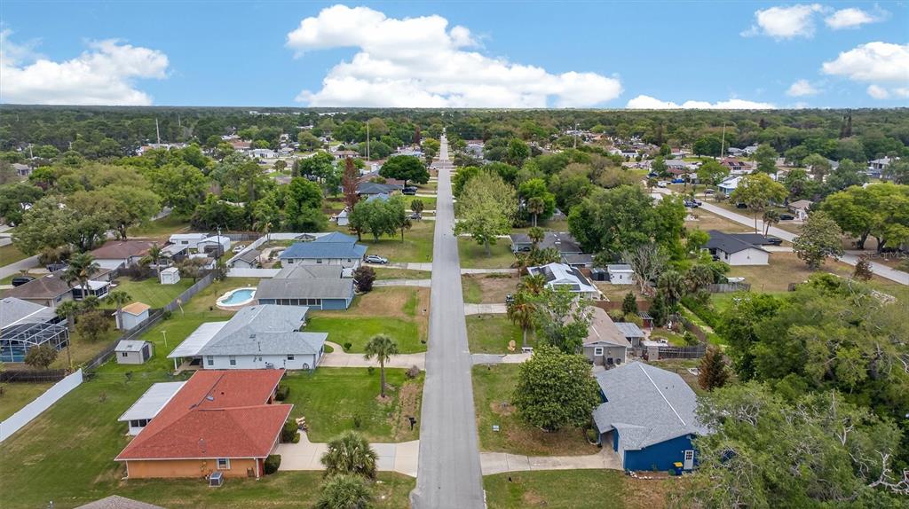 1918 Umbrella Tree Drive Edgewater, FL 32141 - Photo 38 of 44 an aerial view of residential houses with outdoor space and street view