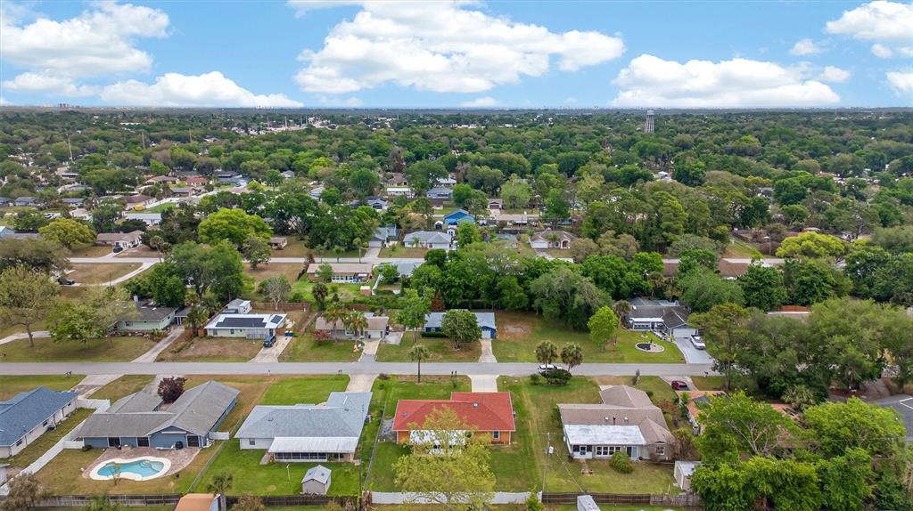 1918 Umbrella Tree Drive Edgewater, FL 32141 - Photo 39 of 44 an aerial view of residential houses with outdoor space and parking