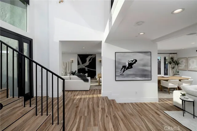 a view of a living room and dining room