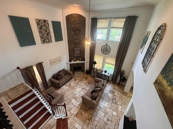 a living room with furniture and a window