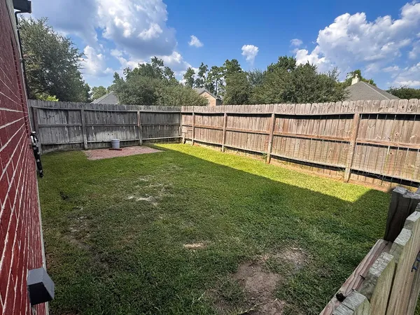 a view of a backyard with a garden
