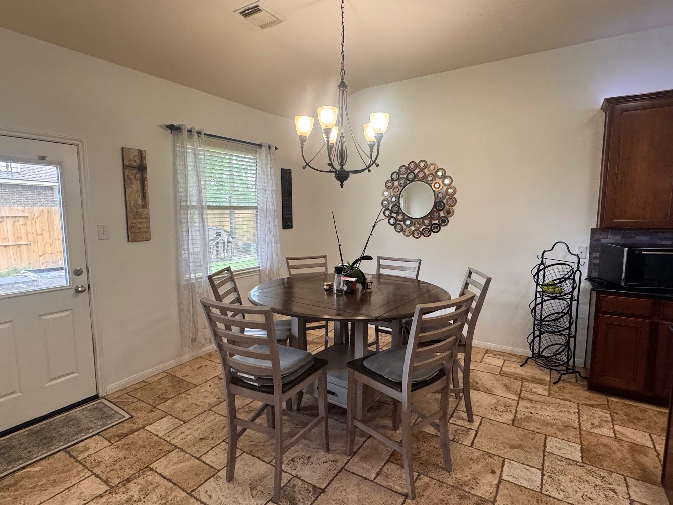 1018 Spring Lakes Haven Spring, TX 77373 - Photo 10 of 31 a view of a dining room with furniture and chandelier