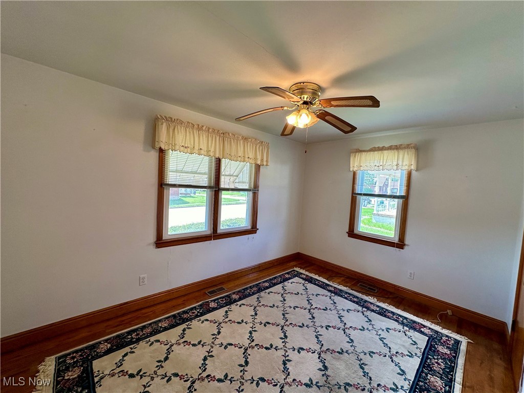 343 Raleigh Avenue Weirton, WV 26062 - Photo 19 of 46 Unfurnished room featuring ceiling fan and hardwood / wood-style flooring