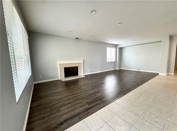 a spacious bathroom with a bathtub and shower
